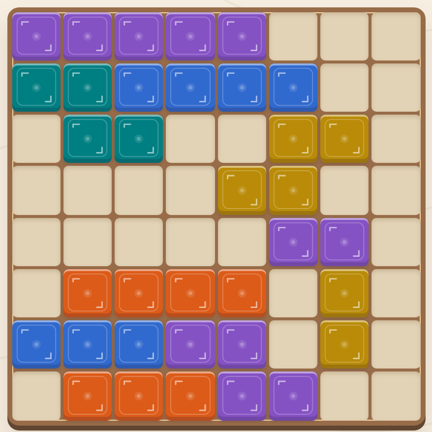 Colourful block pieces fitted together on a partly filled wooden grid.